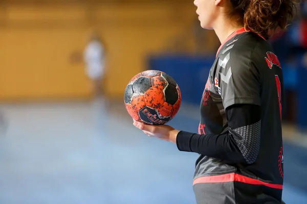 Undefined hands holding a ball prior to the Greek Women Cup Fina