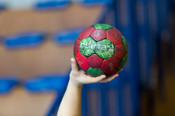 Undefined hands holding a ball prior to the Greek Women Cup Fina