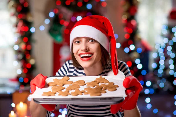 Woman with ginger cookies