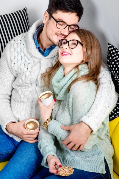 Couple on the couch at home