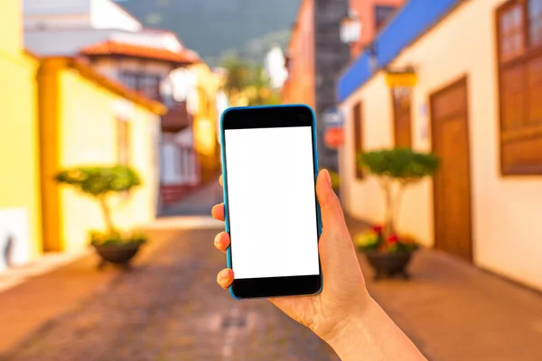Phone on the colorful town background