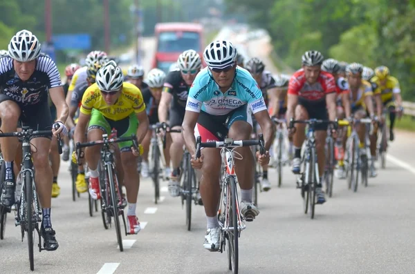 KUANTAN - FEBRUARY 6: unidentified cyclists in action during Kuantan160 on February 6, 2013 in Kuantan, Pahang, Malaysia. KUANTAN160 is a non-profit, non-race 160KM bicycle ride around Kuantan City.