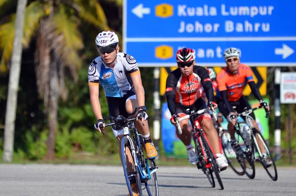 KUANTAN - JUNE 1: unidentified cyclists in action during Kuantan160 on June 1, 2014 in Kuantan, Pahang, Malaysia. KUANTAN160 is a non-profit, non-race 160KM bicycle ride around Kuantan City.