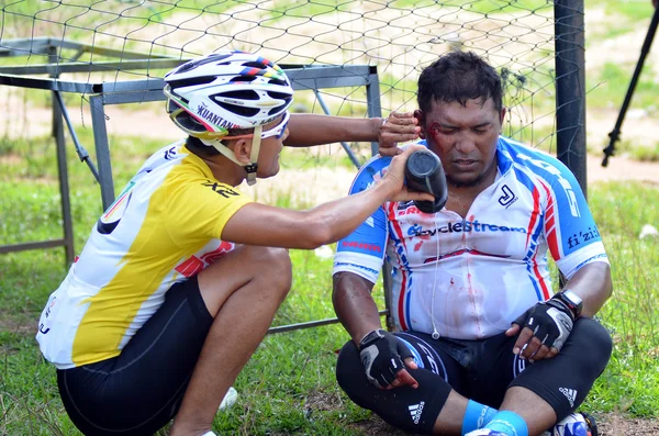 KUANTAN - JUNE 1: unidentified cyclists had a bad injury during Kuantan160 on June 1, 2014 in Kuantan, Pahang, Malaysia. KUANTAN160 is a non-profit, non-race 160KM bicycle ride around Kuantan City.
