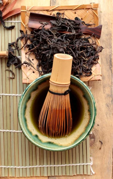 Green tea and dried green tea leaves