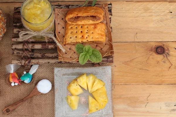 Pineapple juice and fresh pineapple with bread baked with pineap