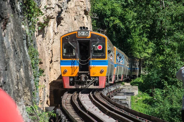 Trains running on death railways track crossing kwai river in kanchanaburi thailand this railways important destination of world war II history builted by soldier prisoners