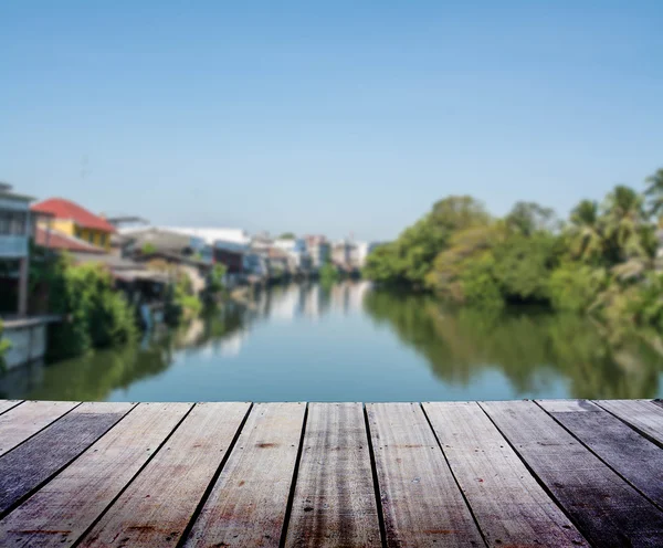 Blurred landscape with wood terrace