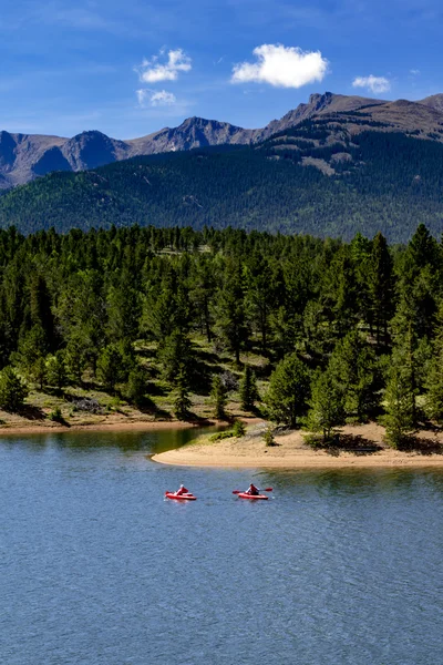 Kayaking and Paddle Boarding on Mountain Lake