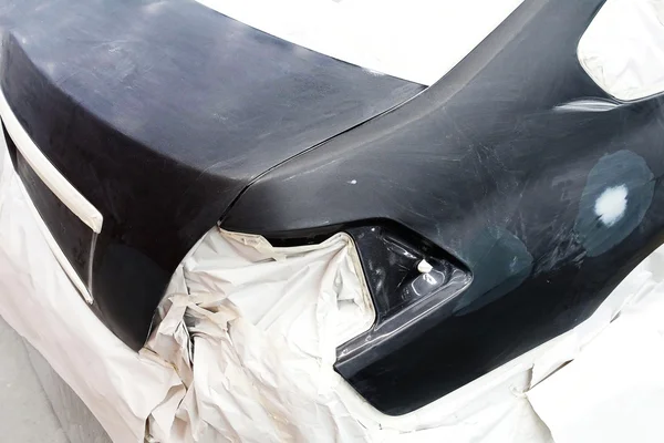 Car body work auto repair paint after the accident during the spraying