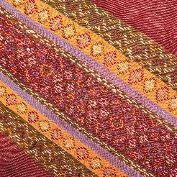 Ancient fabric more than 60 years old colorful thai silk handcraft peruvian style rug surface close up textiles peruvian beautiful background tapestry persian detail pattern farabic fashionable old
