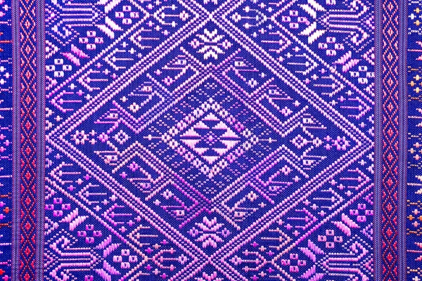 Colorful thai silk handcraft peruvian style rug surface close up More this motif & more textiles peruvian stripe beautiful background tapestry persian nomad detail pattern farabic fashionable textile.