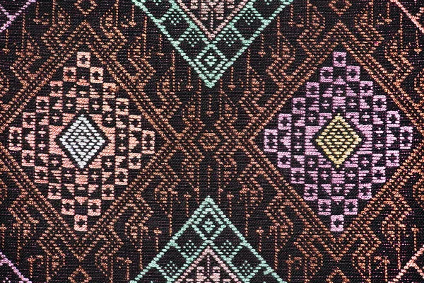 Colorful thai silk handcraft peruvian style rug surface close up More this motif & more textiles peruvian stripe beautiful background tapestry persian nomad detail pattern farabic fashionable textile.