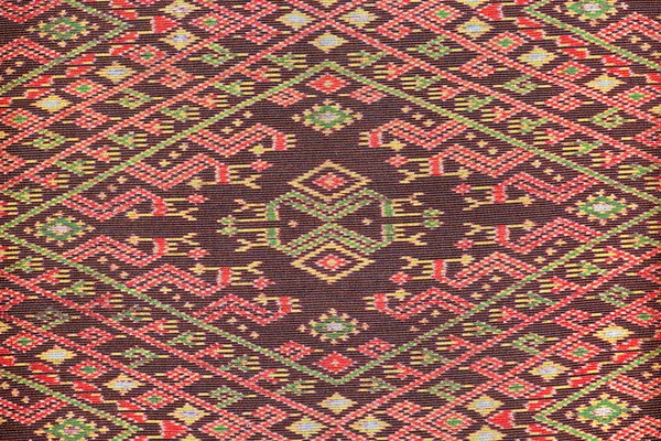 Colorful thai silk handcraft peruvian style rug surface close up More this motif & more textiles peruvian stripe beautiful background tapestry persian nomad detail pattern farabic fashionable textile.