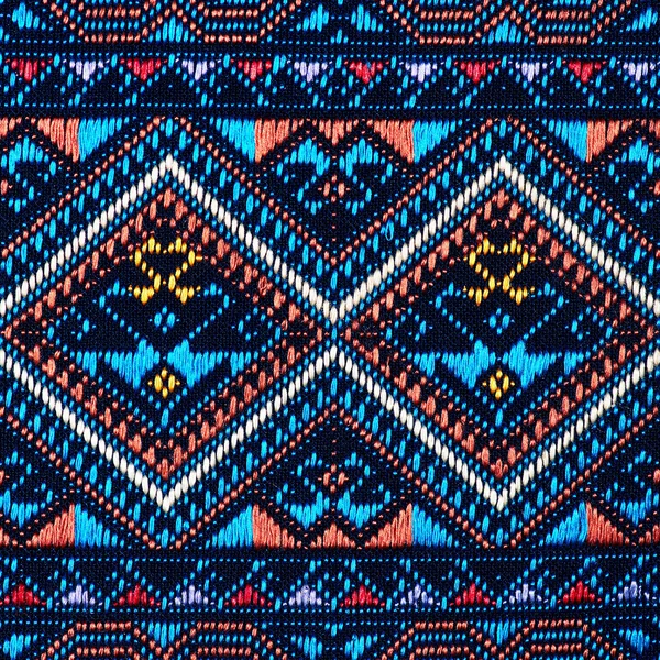 Colorful thai silk handcraft peruvian style rug surface close up More this motif & more textiles peruvian stripe beautiful background tapestry persian nomad detail pattern farabic fashionable textile.