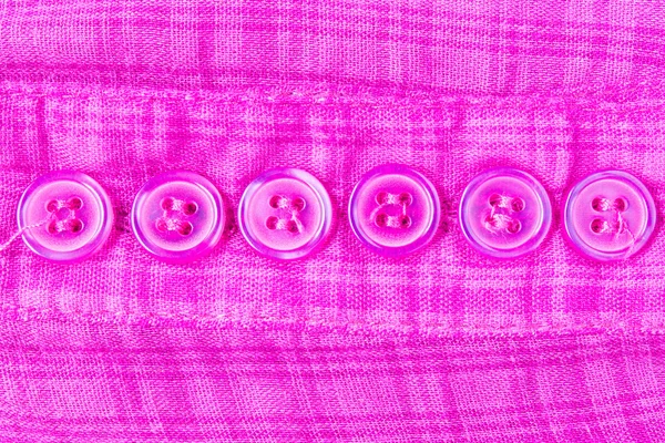 Violet Button on Apparel