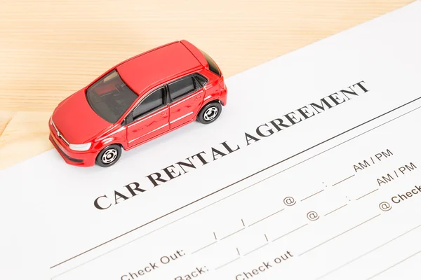 Car Rental Agreement With Red Car on Left View