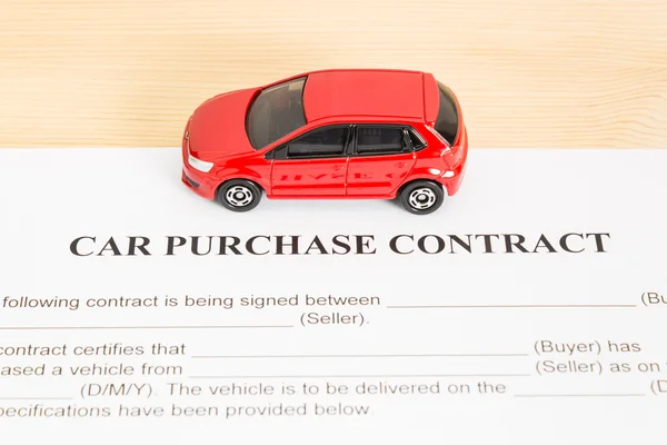 Car Purchase Contract With Red Car on Center