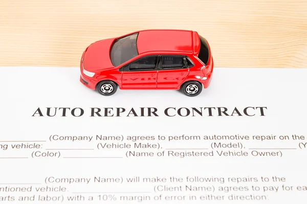 Auto Repair Contract With Red Car on Center