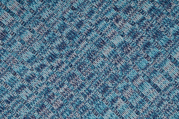 Piece of blue knitted cloth