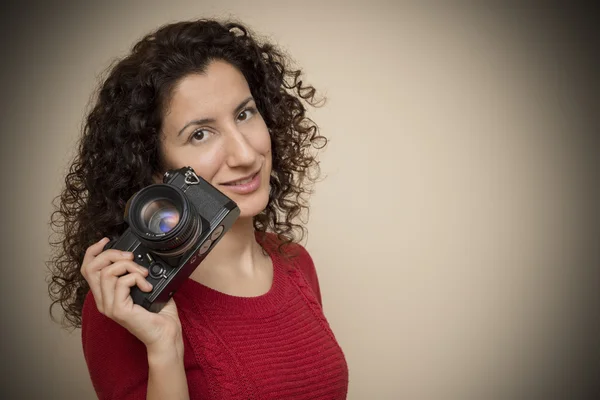 Woman Posing With SLR Camera