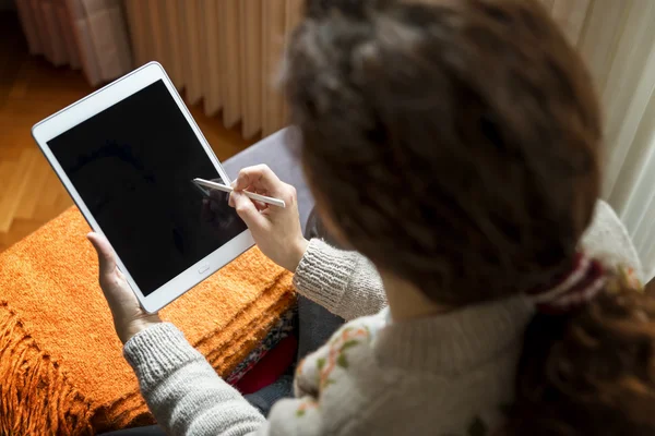 Woman Using Digital Tablet With Touch Pen