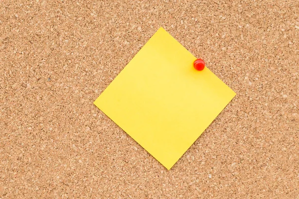 Sticky yellow blank note with space for text.
