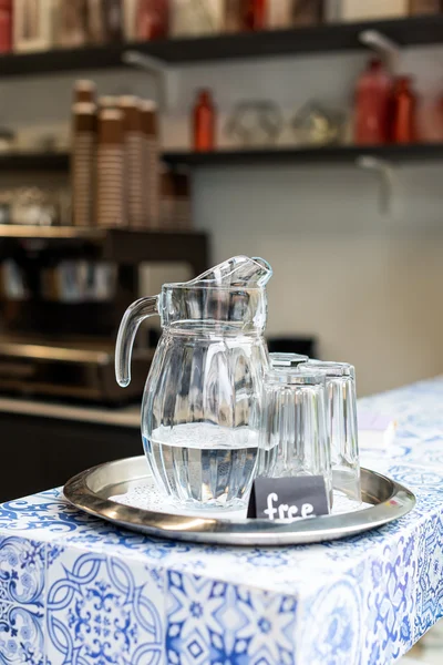Carafe with free water in cafe.