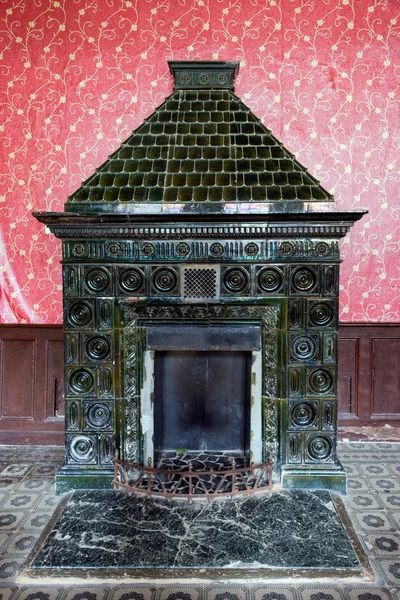 Old fireplace. Inside the Hunting castle of Count Schonborn