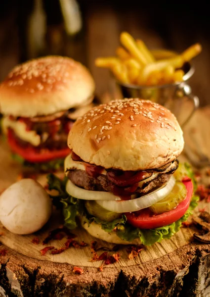 Homemade hamburger with lettuce and cheese.