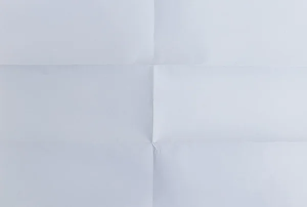 White textured sheet of paper folded in six , background