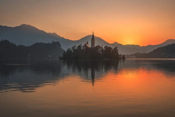 An Island with Church in Bled Lake, Slovenia at Sunrise