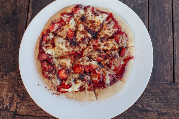 Incredibly delicious strawberry pizza . Pizza with strawberries