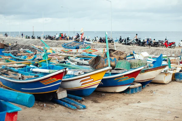 Colorful fishing boats anchored at a Beach in Bali Island, Indon