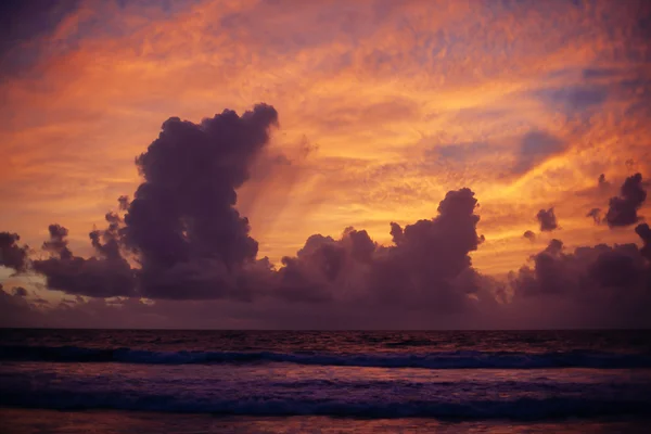 Calm peaceful ocean and beach on tropical sunrise. Bali, Indones