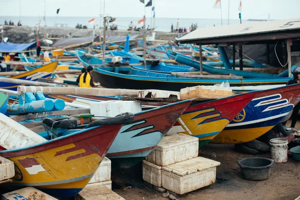 Colorful fishing boats anchored at a Beach in Bali Island, Indon