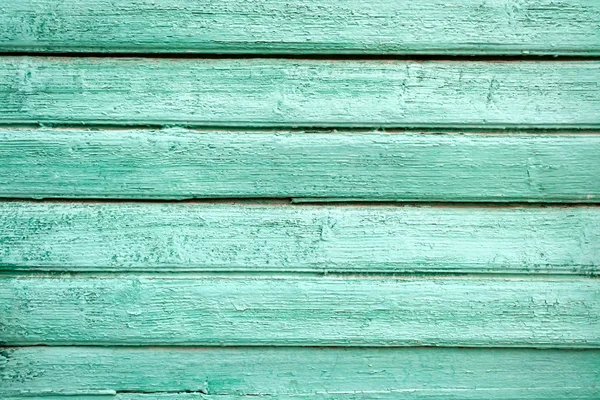 Green old painted wooden door texture as background
