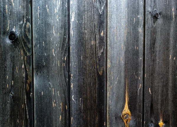 Vertical wooden fence close up