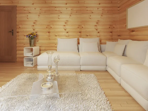 Modern living in a log interior with large white corner sofa.