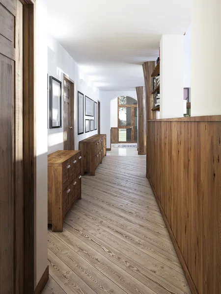 The corridor in a loft-style with wood paneling and paintings