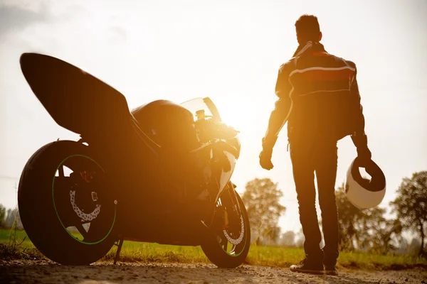 Biker with his bike