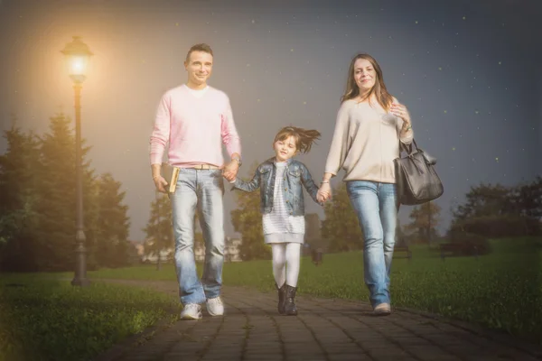 Happy family walking outdoors
