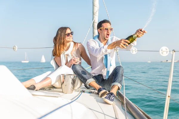 Couple celebrating on the boat