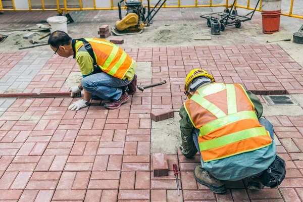 Bricklayers at work