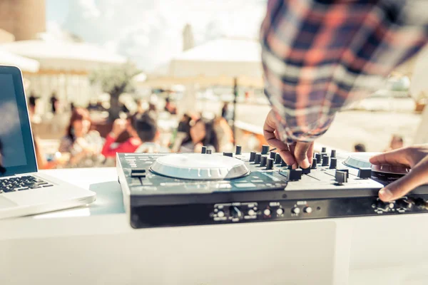 Dj mixer close up while he is mixing