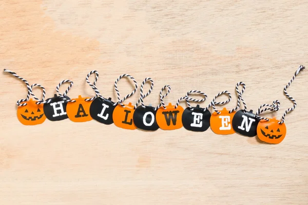 Halloween flags , black and orange flags on wooden background