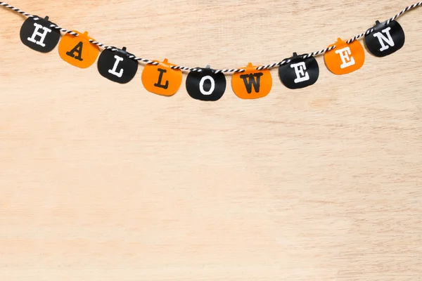 Halloween flags , black and orange flags on wooden background