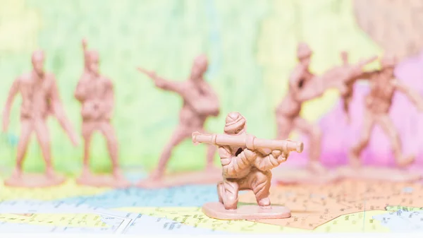 Toy Soldiers  on paper map background
