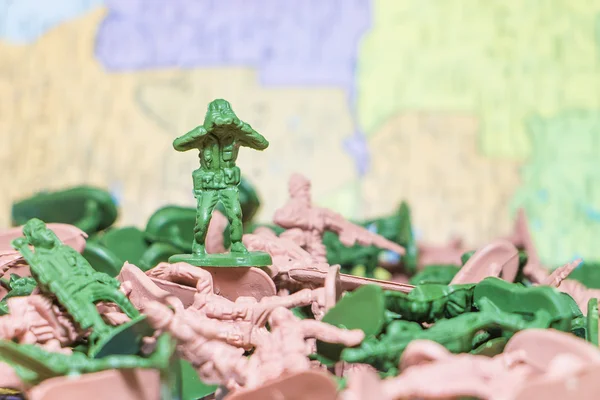 Toy Soldiers  on paper map background