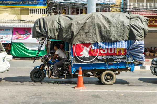 CHIANGRAI, THAILAND - OCT 31 : people and vehicle waiting to pas